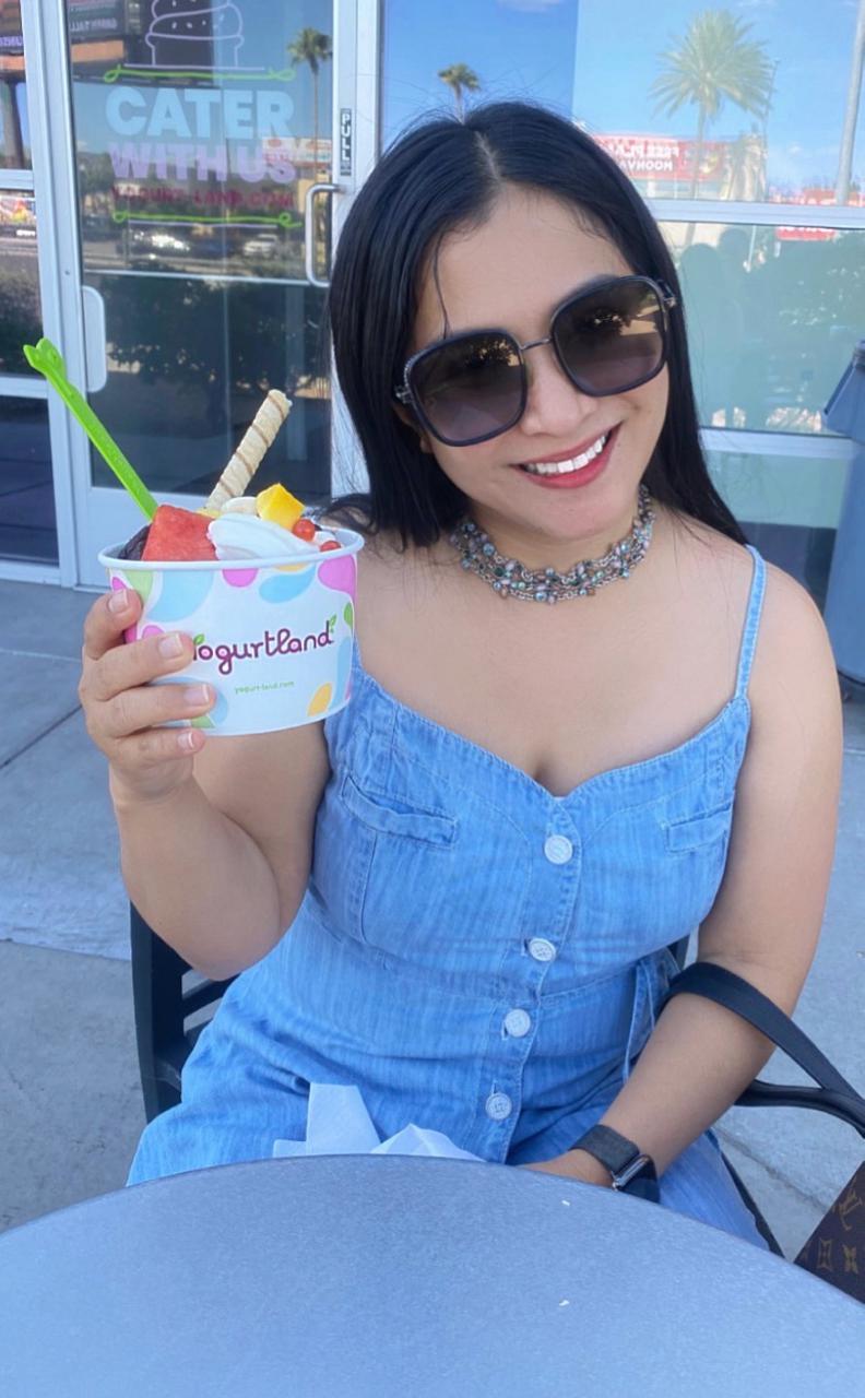 Leona enjoying frozen yogurt
